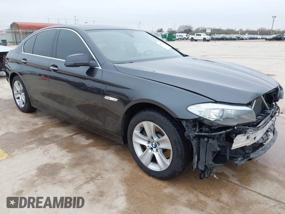 2013 BMW 5 Series 528i xDrive with VIN WBAXH5C50DDW15574, listed as a IAAI auction lot 41572993 with 59,188 mi miles. Bid and sale history available at carsss.com. Image 1.
