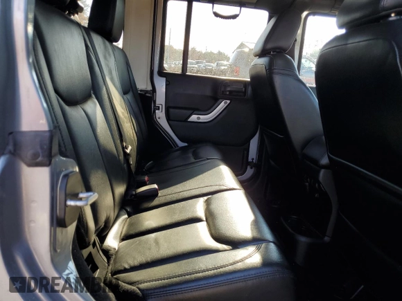 2013 Jeep Wrangler Unlimited Rubicon 10th Anniversary z VIN 1C4HJWFG3DL692993, wystawiony jako Copart lot #78599224 z przebiegiem 135 942 mil mil oraz Szkoda całkowita • Salvage title. Historia ofert i sprzedaży dostępna na DreamBid. Obrazek 10.