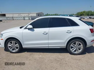 2016 Audi Q3 Premium Plus with VIN WA1EFCFS1GR006694, listed as a IAAI auction lot 42007479 with 103,901 mi miles and . Bid and sale history available at DreamBid. Image 14.