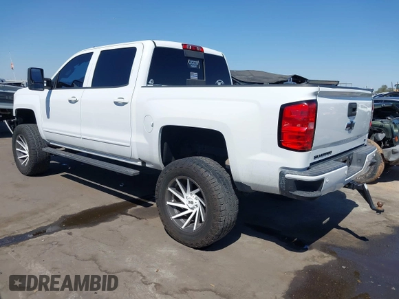 2016 Chevrolet Silverado 1500 LT with VIN 3GCUKREC5GG369915, listed as a IAAI auction lot 42082155 with 137,671 mi miles and . Bid and sale history available at DreamBid. Image 3.