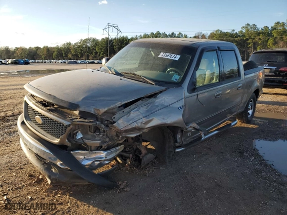 2001 Ford F-150 SuperCrew XLT with VIN 1FTRW07W31KA86300, listed as a Copart auction lot 57283434 with 129,416 mi miles and Salvage Title. Bid and sale history available at carsss.com. Image 1.