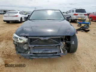 2018 BMW 3 Series 320i with VIN WBA8A9C56JAH12021, listed as a Copart auction lot 58971175 with 100,317 mi miles and Salvage title. Bid and sale history available at DreamBid. Image 5.