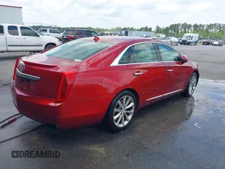 2013 Cadillac XTS Premium with VIN 2G61S5S34D9237236, listed as a IAAI auction lot 41994164 with 218,719 mi miles. Bid and sale history available at carsss.com. Image 4.