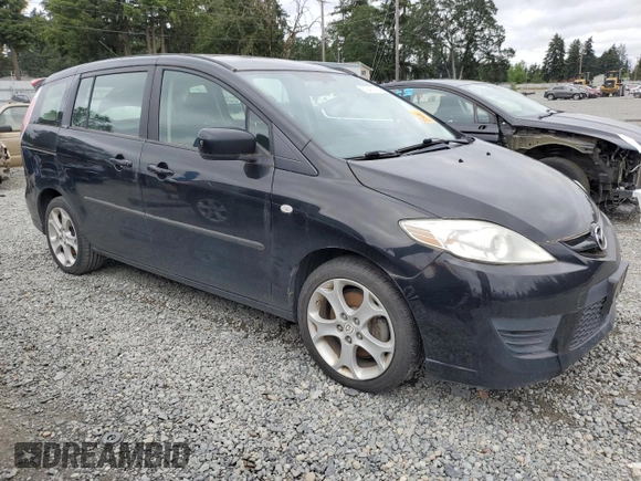 2009 Mazda 5 Sport with VIN JM1CR29L190332781, listed as a Copart auction lot 59430134 with 157,017 mi miles and Clean Title. Bid and sale history available at DreamBid. Image 4.