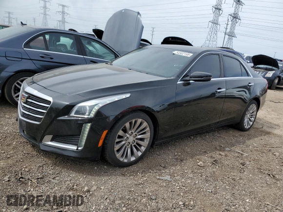 2015 Cadillac CTS Luxury AWD with VIN 1G6AX5SX6F0115950, listed as a Copart auction lot 54502195 with 118,256 mi miles and Salvage title. Bid and sale history available at DreamBid. Image 1.