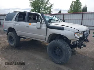 1998 Toyota 4Runner SR5 with VIN JT3HN86R0W0165939, listed as a IAAI auction lot 40318302 with 318,707 mi miles and . Bid and sale history available at DreamBid. Image 1.
