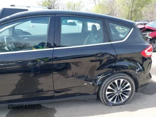 2017 Ford C-Max Energi Titanium with VIN 1FADP5FU2HL115199, listed as a IAAI auction lot 42001944 with 57,609 mi miles. Bid and sale history available at carsss.com. Image 6.