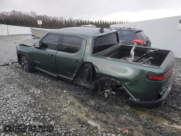 2024 Rivian R1T Adventure z VIN 7FCTGCAA1RN030829, wystawiony jako Copart lot #81459854 z przebiegiem Nie podano mil oraz Szkody całkowita. Historia ofert i sprzedaży dostępna na DreamBid. Obrazek 2.