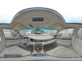 2002 Cadillac Seville Touring STS z VIN 1G6KY54932U174599, wystawiony jako Copart lot #44996845 z przebiegiem 168 819 mil mil oraz Szkoda całkowita • Salvage title. Historia ofert i sprzedaży dostępna na DreamBid. Obrazek 13.