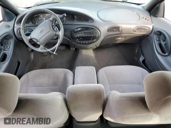 1999 Ford Taurus SE z VIN 1FAFP58S0XA272714, wystawiony jako Copart lot #48966215 z przebiegiem 255 885 mil mil oraz Szkoda całkowita • Salvage title. Historia ofert i sprzedaży dostępna na DreamBid. Obrazek 8.