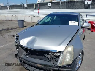 2008 Cadillac CTS RWD with VIN 1G6DM577280111413, listed as a IAAI auction lot 42238643 with 114,706 mi miles and . Bid and sale history available at DreamBid. Image 6.