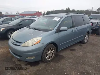 2006 Toyota Sienna XLE with VIN 5TDZA22C06S397674, listed as a IAAI auction lot 41855433 with 235,258 mi miles. Bid and sale history available at carsss.com. Image 2.