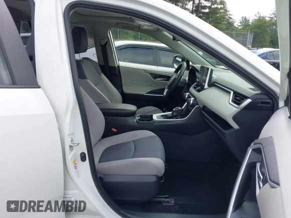 2019 Toyota RAV4 XLE with VIN JTMP1RFV6KD515454, listed as a IAAI auction lot 42618019 with 85,868 mi miles and . Bid and sale history available at DreamBid. Image 5.
