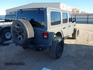 2018 Jeep Wrangler Unlimited Sahara with VIN 1C4HJXEG8JW239535, listed as a IAAI auction lot 41711596 with 85,675 mi miles. Bid and sale history available at carsss.com. Image 4.
