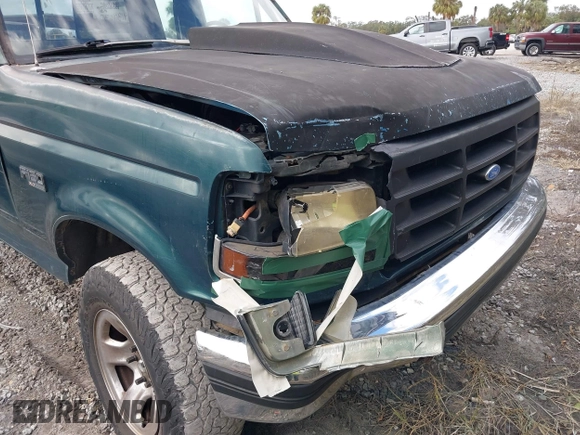 1993 Ford F-150 z VIN 1FTEX15N7PKB65960, wystawiony jako IAAI lot #41306323 z przebiegiem Nie podano mil oraz . Historia ofert i sprzedaży dostępna na DreamBid. Obrazek 13.