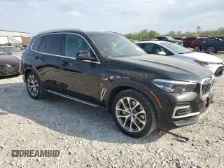 2023 BMW X5 xDrive45e z VIN 5UXTA6C03P9P26996, wystawiony jako Copart lot #53747565 z przebiegiem 52 599 mil mil oraz Szkoda całkowita • Salvage title. Historia ofert i sprzedaży dostępna na DreamBid. Obrazek 4.