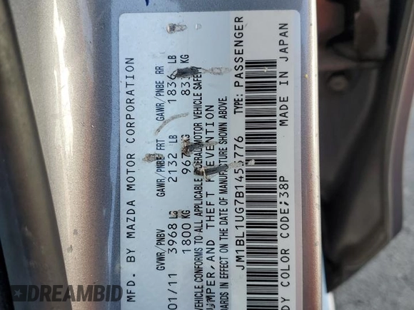 2011 Mazda 3 i Sport with VIN JM1BL1UG7B1455776, listed as a Copart auction lot 54235235 with 133,040 mi miles and Salvage Title. Bid and sale history available at DreamBid. Image 12.
