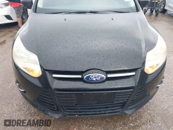 2012 Ford Focus SE with VIN 1FAHP3F24CL174400, listed as a IAAI auction lot 41463139 with 187,132 mi miles and . Bid and sale history available at DreamBid. Image 6.