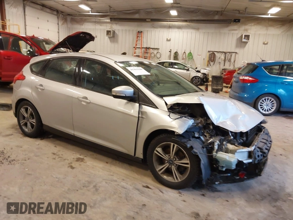 2016 Ford Focus SE with VIN 1FADP3KE2GL377824, listed as a IAAI auction lot 41461648 with 112,038 mi miles and . Bid and sale history available at carsss.com. Image 1.