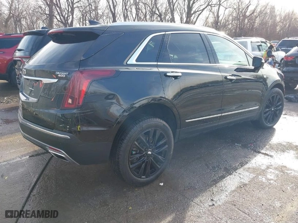 2021 Cadillac XT5 AWD Premium Luxury with VIN 1GYKNDRS0MZ135660, listed as a IAAI auction lot 41123089 with 26,361 mi miles. Bid and sale history available at carsss.com. Image 4.