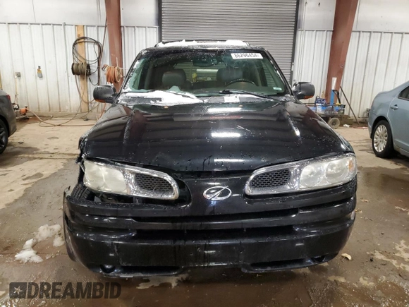 2002 Oldsmobile Bravada z VIN 1GHDT13S522107056, wystawiony jako Copart lot #86296454 z przebiegiem 169 856 mil mil oraz Tytuł czysty. Historia ofert i sprzedaży dostępna na DreamBid. Obrazek 5.