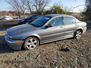 2002 Jaguar X-Type with VIN SAJEA51CX2WC59639, listed as a Copart auction lot 81078514 with 99,183 mi miles and Salvage Title. Bid and sale history available at carsss.com. Image 1.