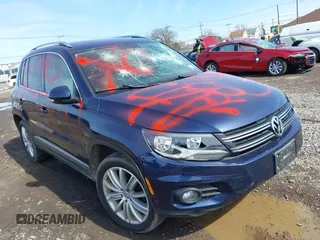 2015 Volkswagen Tiguan S z VIN WVGAV7AX7FW594369, wystawiony jako IAAI lot #41972548 z przebiegiem 179 169 mil mil oraz . Historia ofert i sprzedaży dostępna na DreamBid. Obrazek 1.