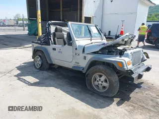 2006 Jeep Wrangler X z VIN 1J4FA39S36P703941, wystawiony jako IAAI lot #42220361 z przebiegiem 148 829 mil mil oraz . Historia ofert i sprzedaży dostępna na DreamBid. Obrazek 1.