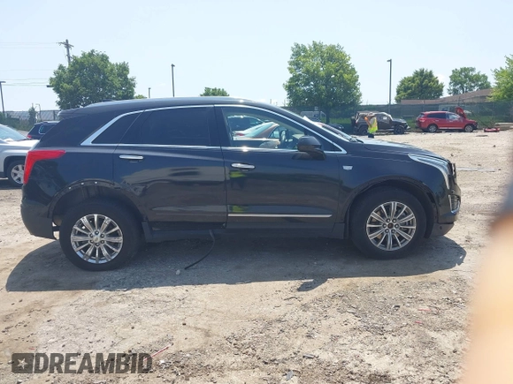 2018 Cadillac XT5 Luxury AWD z VIN 1GYKNDRS0JZ139185, wystawiony jako IAAI lot #42551426 z przebiegiem 109 699 mil mil oraz . Historia ofert i sprzedaży dostępna na DreamBid. Obrazek 13.