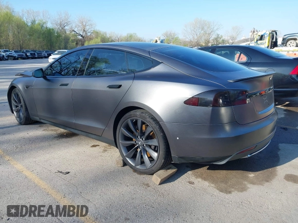2016 Tesla Model S 90D with VIN 5YJSA1E43GF115310, listed as a IAAI auction lot 42002240 with 108,172 mi miles and . Bid and sale history available at DreamBid. Image 3.