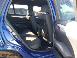2015 BMW X1 xDrive28i with VIN WBAVL1C56FVY32753, listed as a IAAI auction lot 41759454 with 130,823 mi miles. Bid and sale history available at carsss.com. Image 8.