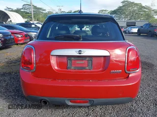 2015 MINI Hardtop 4 Door z VIN WMWXS5C57F2C63418, wystawiony jako IAAI lot #41938785 z przebiegiem 101 712 mil mil oraz . Historia ofert i sprzedaży dostępna na DreamBid. Obrazek 16.