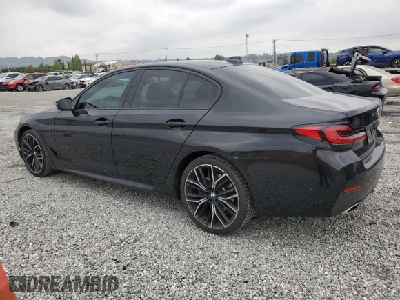 2021 BMW 5 Series 530e with VIN WBA13AG00MCF09677, listed as a Copart auction lot 54907205 with 50,033 mi miles and Salvage title. Bid and sale history available at DreamBid. Image 2.