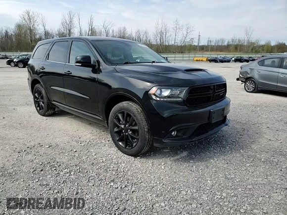 2018 Dodge Durango GT with VIN 1C4RDJDG5JC497197, listed as a Copart auction lot 54826695 with 67,262 mi miles and Salvage Title. Bid and sale history available at DreamBid. Image 14.