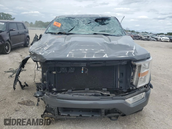 2021 Ford F-150 XL z VIN 1FTEW1EPXMFA72777, wystawiony jako Copart lot #58859095 z przebiegiem Nie podano mil oraz Szkoda całkowita • Salvage title. Historia ofert i sprzedaży dostępna na DreamBid. Obrazek 5.