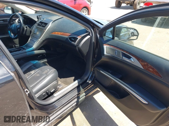 2015 Lincoln MKZ with VIN 3LN6L2J96FR625761, listed as a IAAI auction lot 42235387 with 132,183 mi miles and . Bid and sale history available at DreamBid. Image 5.