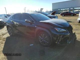 2021 Lexus UX with VIN JTHE9JBH0M2036963, listed as a Copart auction lot 82687744 with 24,857 mi miles and Salvage Title. Bid and sale history available at carsss.com. Image 4.