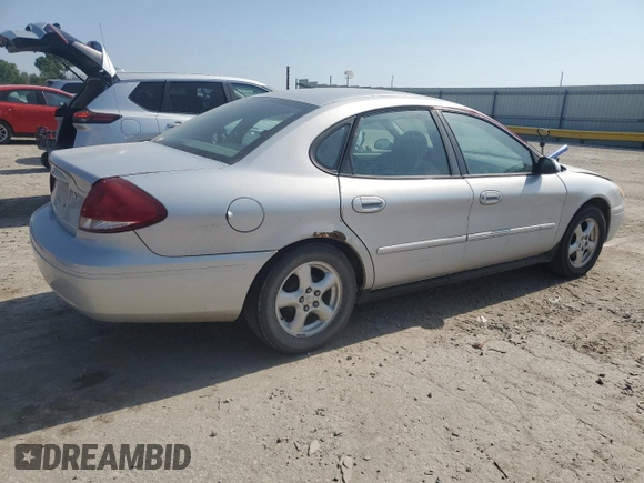2004 Ford Taurus SE with VIN 1FAFP53U04G133586, listed as a Copart auction lot 59972925 with 228,938 mi miles and Salvage title. Bid and sale history available at DreamBid. Image 3.