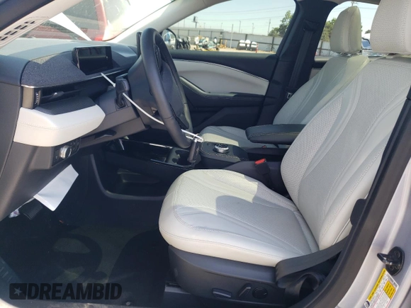 2022 Ford Mustang Mach-E Premium with VIN 3FMTK3SU4NMA11494, listed as a Copart auction lot 61605875 with 23,879 mi miles and Salvage title. Bid and sale history available at DreamBid. Image 7.