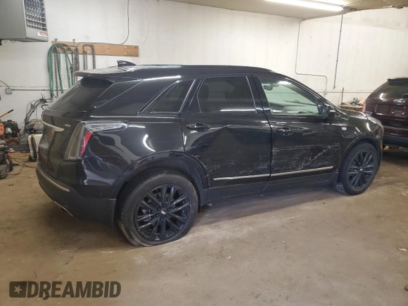 2021 Cadillac XT5 AWD Sport with VIN 1GYKNHRS1MZ103033, listed as a Copart auction lot 58586425 with 65,229 mi miles and Salvage title. Bid and sale history available at DreamBid. Image 3.