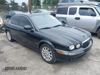 2002 Jaguar X-Type 2.5L Manual with VIN SAJEA51D42XC33363, listed as a IAAI auction lot 42294448 with 86,155 mi miles and . Bid and sale history available at DreamBid. Image 1.