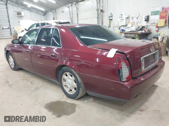 2002 Cadillac DeVille with VIN 1G6KD54Y12U214732, listed as a IAAI auction lot 42018412 with 139,474 mi miles. Bid and sale history available at carsss.com. Image 3.