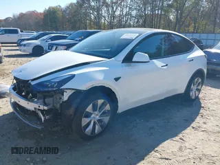 2023 Tesla Model Y Long Range with VIN 7SAYGAEE1PF828338, listed as a IAAI auction lot 40978725 with Not Provided miles and . Bid and sale history available at DreamBid. Image 23.