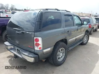 2001 GMC Yukon SLE z VIN 1GKEC13T91R205942, wystawiony jako IAAI lot #42207894 z przebiegiem 265 808 mil mil oraz . Historia ofert i sprzedaży dostępna na DreamBid. Obrazek 4.