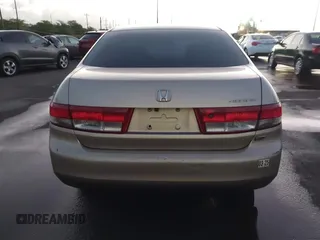 2003 Honda Accord EX z VIN 1HGCM66503A052221, wystawiony jako IAAI lot #41699132 z przebiegiem 132 623 mil mil oraz . Historia ofert i sprzedaży dostępna na DreamBid. Obrazek 16.
