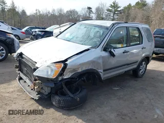 2002 Honda CR-V LX z VIN JHLRD78532C050707, wystawiony jako IAAI lot #41704967 z przebiegiem 306 564 mil mil oraz . Historia ofert i sprzedaży dostępna na DreamBid. Obrazek 18.