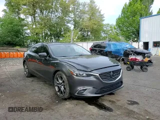 2017 Mazda 6 Grand Touring с VIN JM1GL1W55H1140064, выставлен на аукционе Copart как лот 57503425 с пробегом 74 304 миль миль и Списание • Salvage title. История ставок и продаж доступна на DreamBid. Изображение 13.