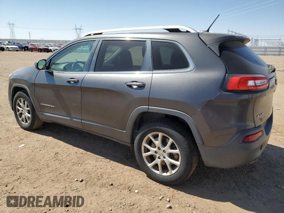 2015 Jeep Cherokee Latitude z VIN 1C4PJMCB2FW734385, wystawiony jako Copart lot #57333805 z przebiegiem 121 249 mil mil oraz Szkoda całkowita • Salvage title. Historia ofert i sprzedaży dostępna na DreamBid. Obrazek 2.