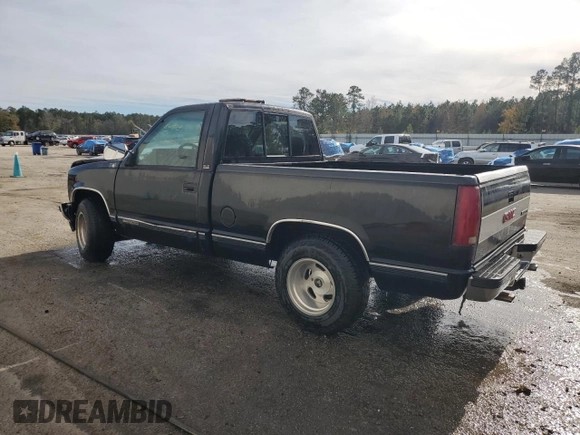 1991 GMC Sierra 1500 with VIN 1GTDC14H4MZ526745, listed as a Copart auction lot 82861084 with 227,672 mi miles and Salvage Title. Bid and sale history available at DreamBid. Image 2.