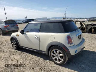 2010 MINI Hardtop with VIN WMWMF3C5XATZ66863, listed as a Copart auction lot 55695585 with 59,294 mi miles and Clean Title. Bid and sale history available at DreamBid. Image 2.